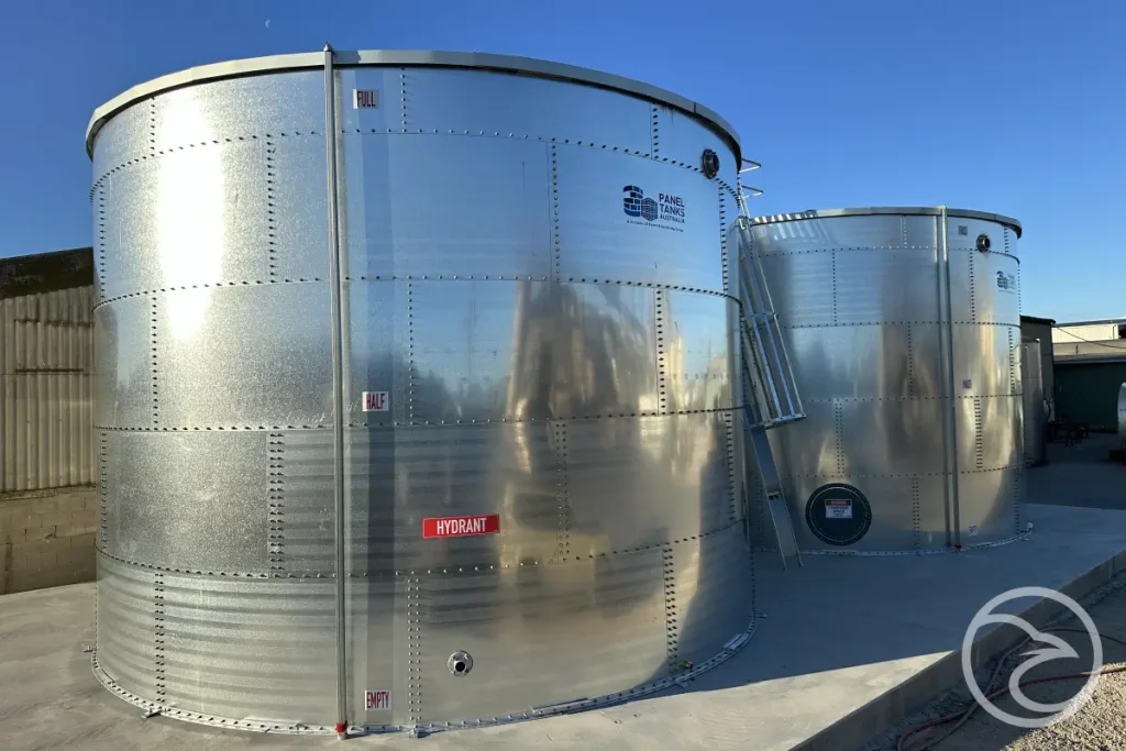 Industrial galvanized water tank exposed to harsh operating conditions