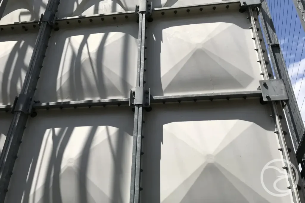 sectional water tank panels being assembled on site