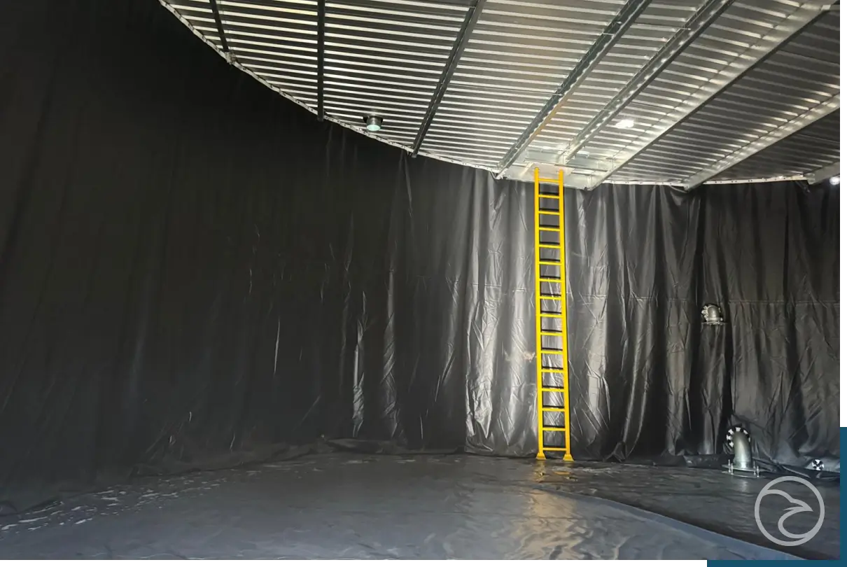 PVC liner installation inside industrial water storage