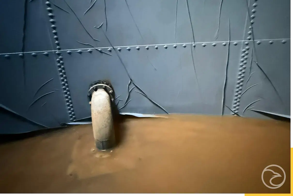 dirty water tank before cleaning and inspection process