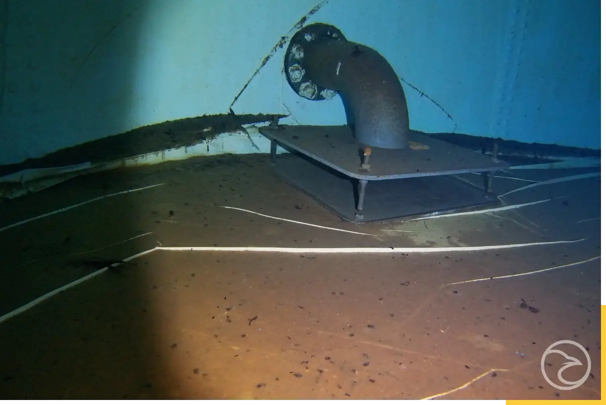 sediment buildup inside water tank detected