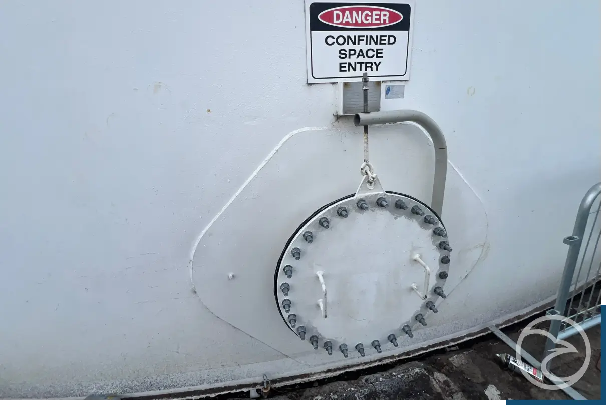 Confined space entry services for industrial tanks and vessels